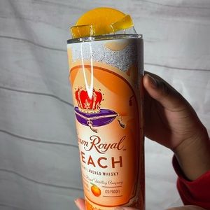 20oz. Crown Royal Peach tumbler with 3d lid. Comes with a straw.